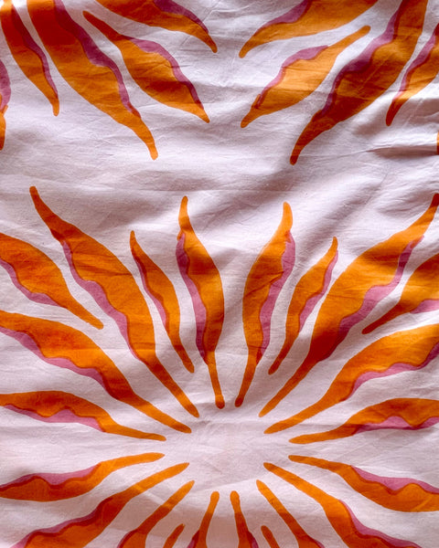 Pink and orange block printed fabric